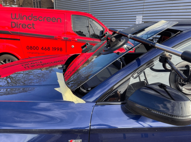 windscreen replacement on a blue car